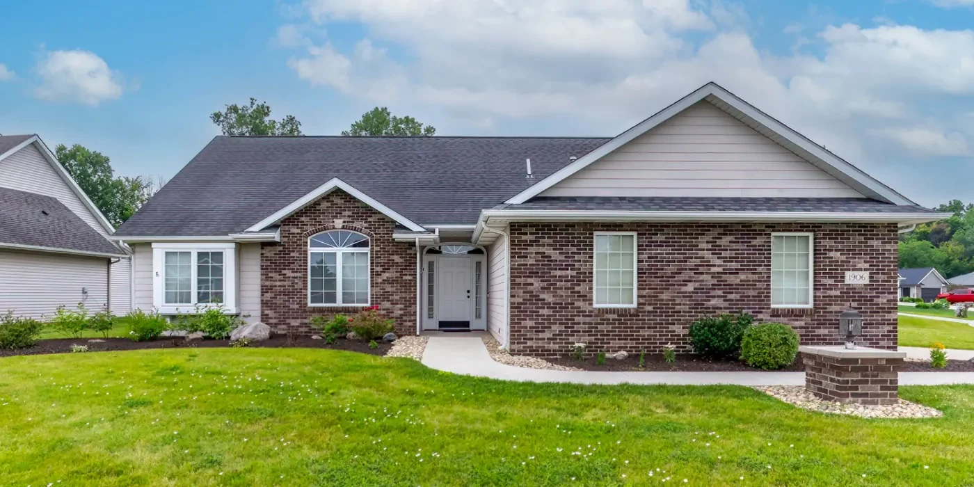 Front exterior of 1906 Kelleys Landing — brick and vinyl with asphalt shingle roof